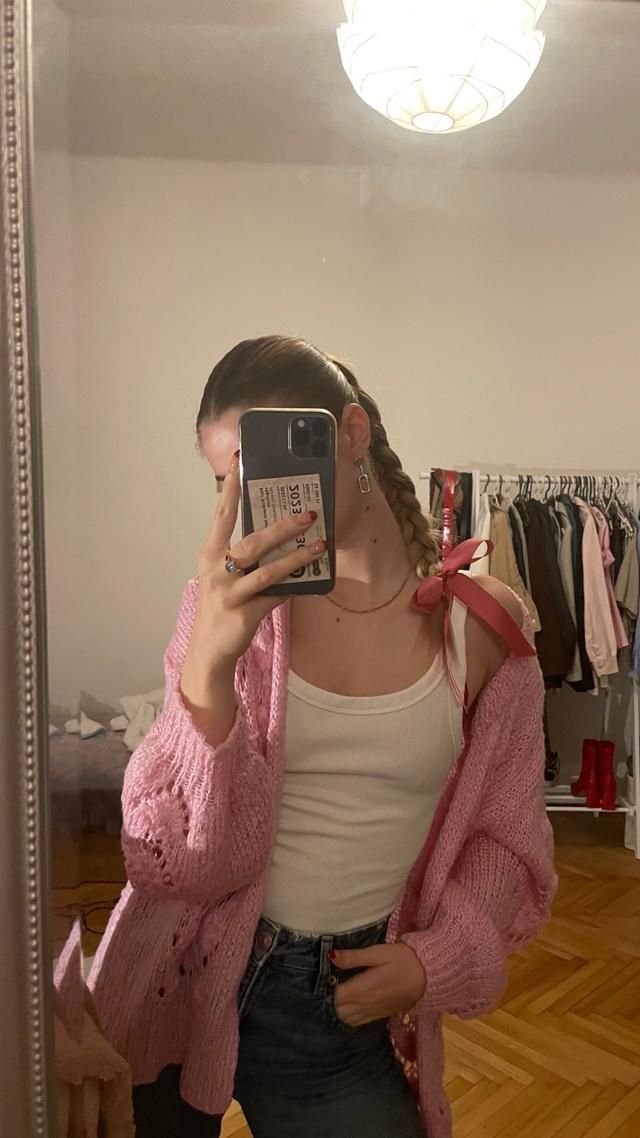 look at my new thrifted handmade baby pink cardigan i am obsessed